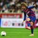 Antoine Griezmann passes the ball during a friendly match in Saitama, Japan during the team’s 2019 tour.